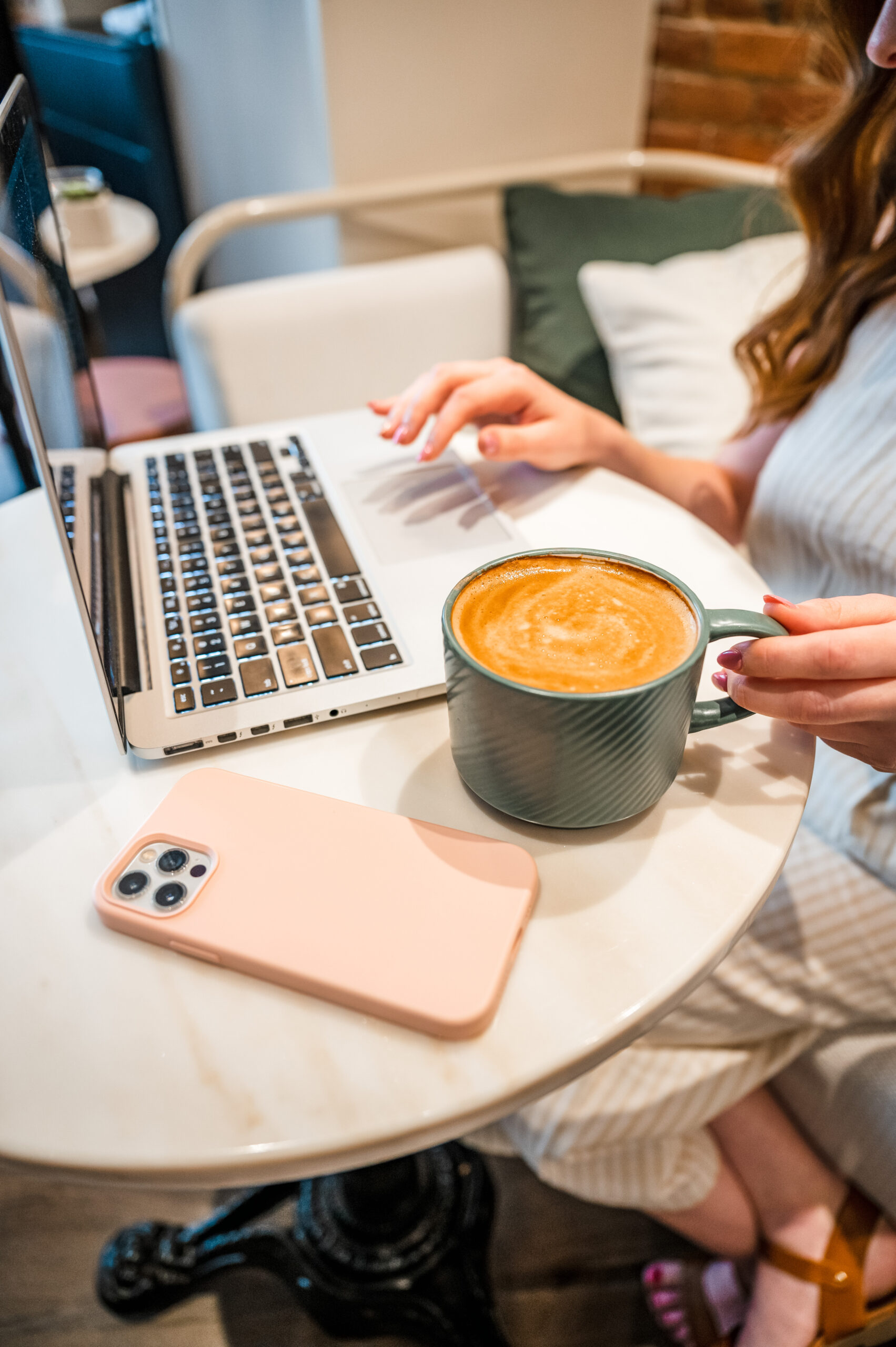 Montreal social media strategist planning a content calendar on her laptop